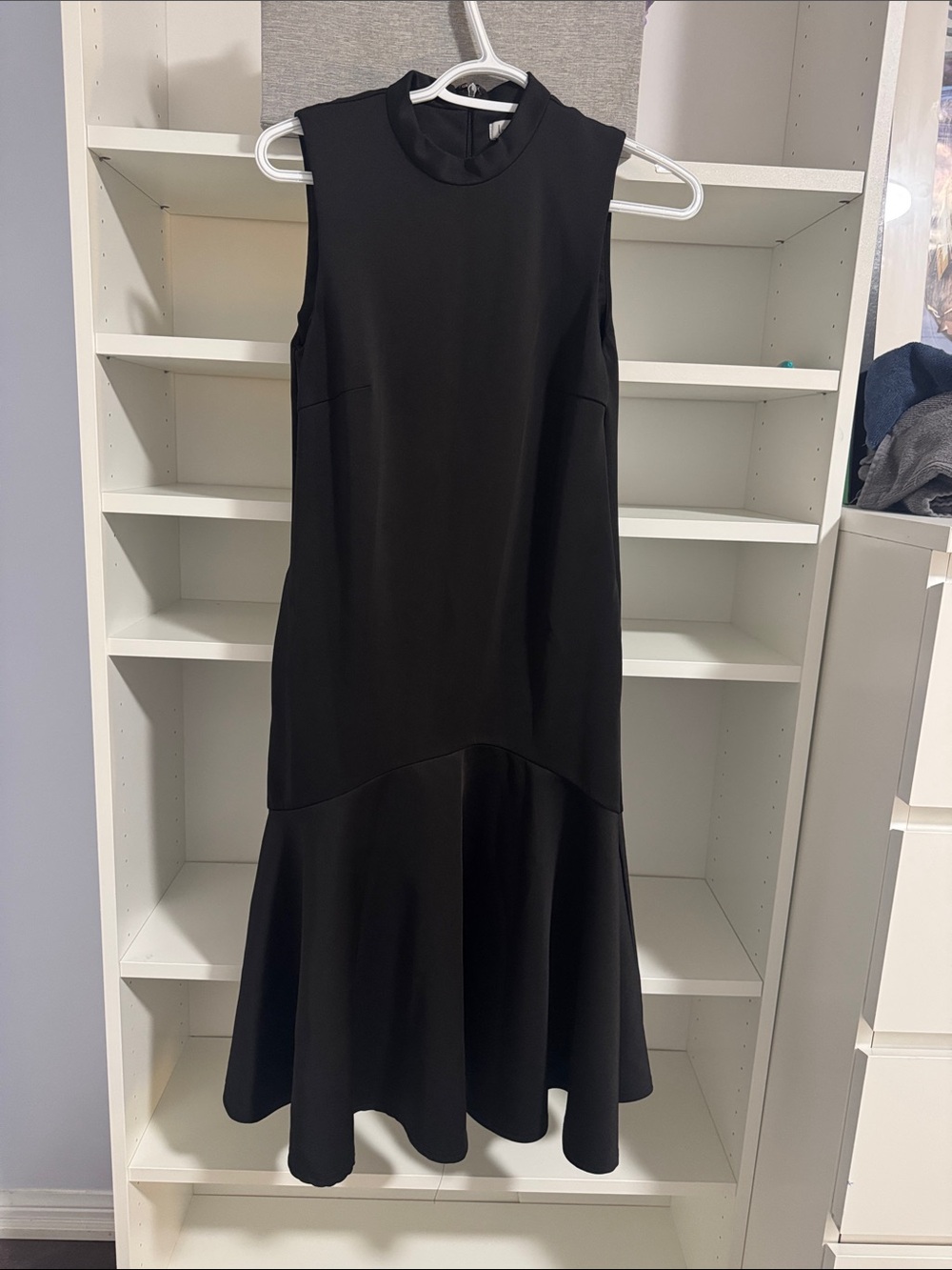 Sleeveless Black Midi Dress with Flared Hem